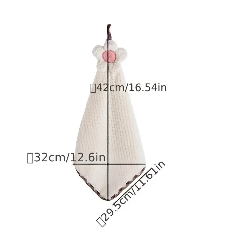 Measurement chart of a baby swaddle with dimensions labeled in centimeters and inches.