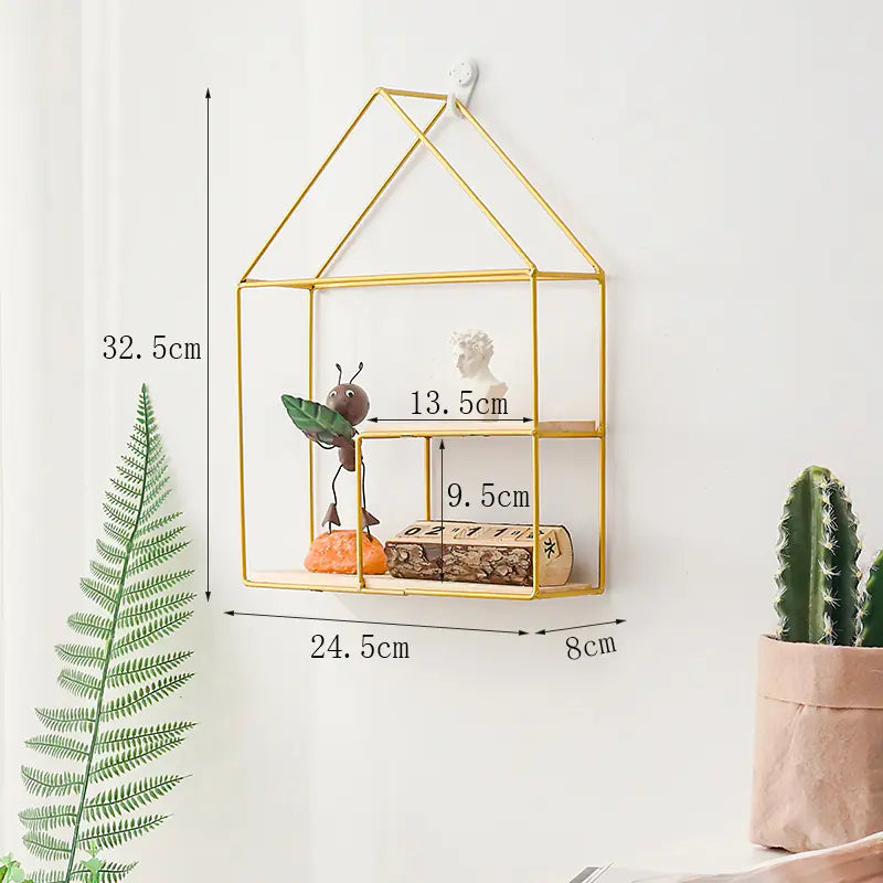 Gold geometric wall shelf with measurements on a white background