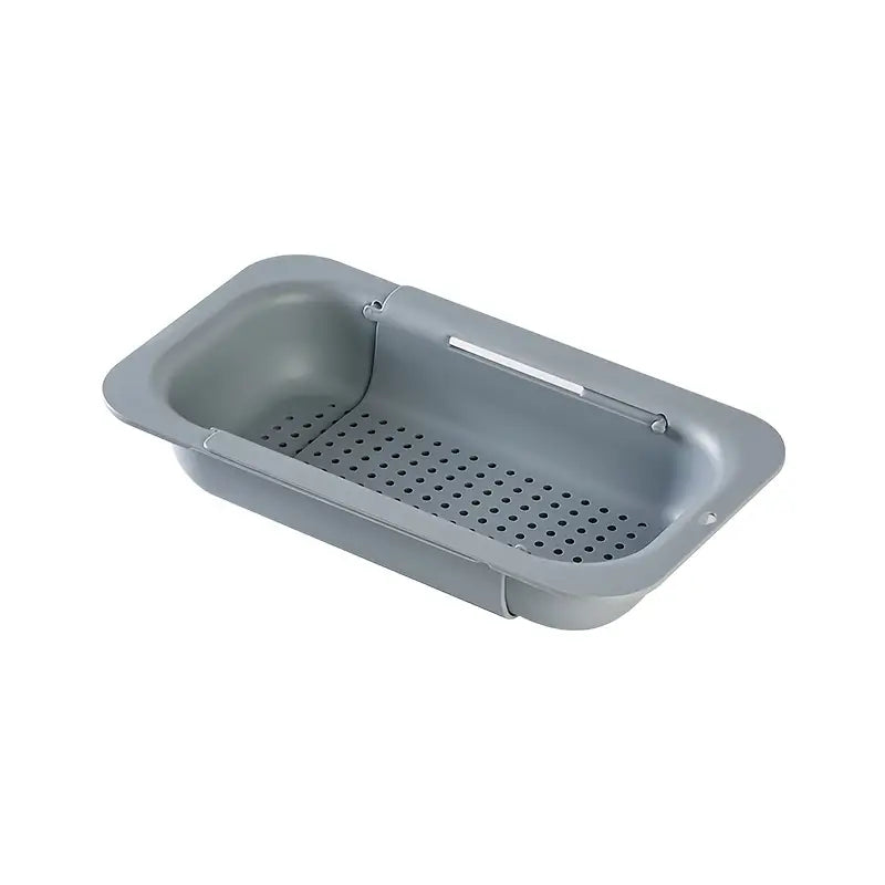 Gray perforated tray with handle on a white background