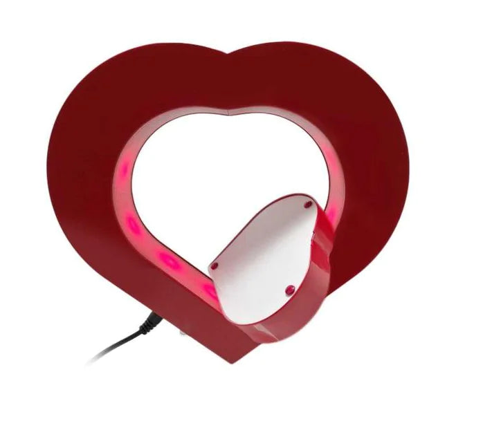 Heart-shaped light fixture with a red border on a white background