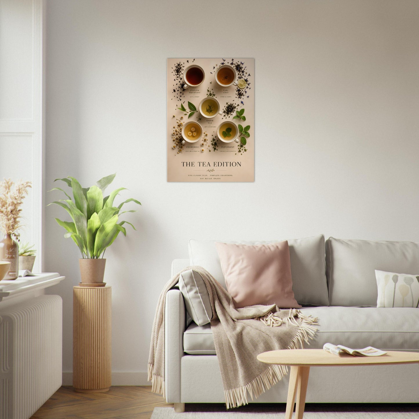 Living room with a sofa, plant, and wall art featuring tea cups and leaves.