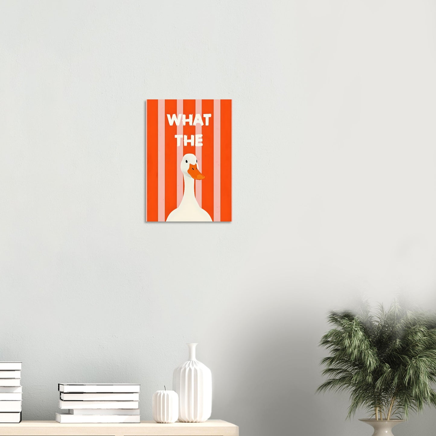 Poster with a duck illustration and text on an orange background, displayed on a wall.