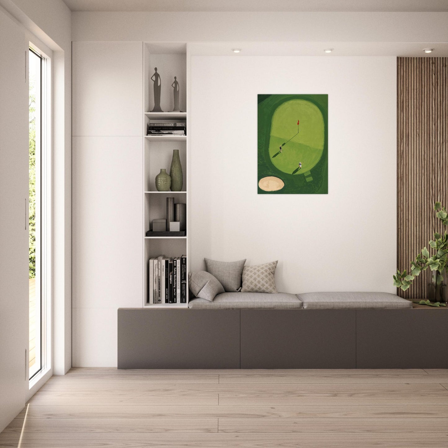 Modern living room with a gray sofa, bookshelf, and minimalist golf wall art