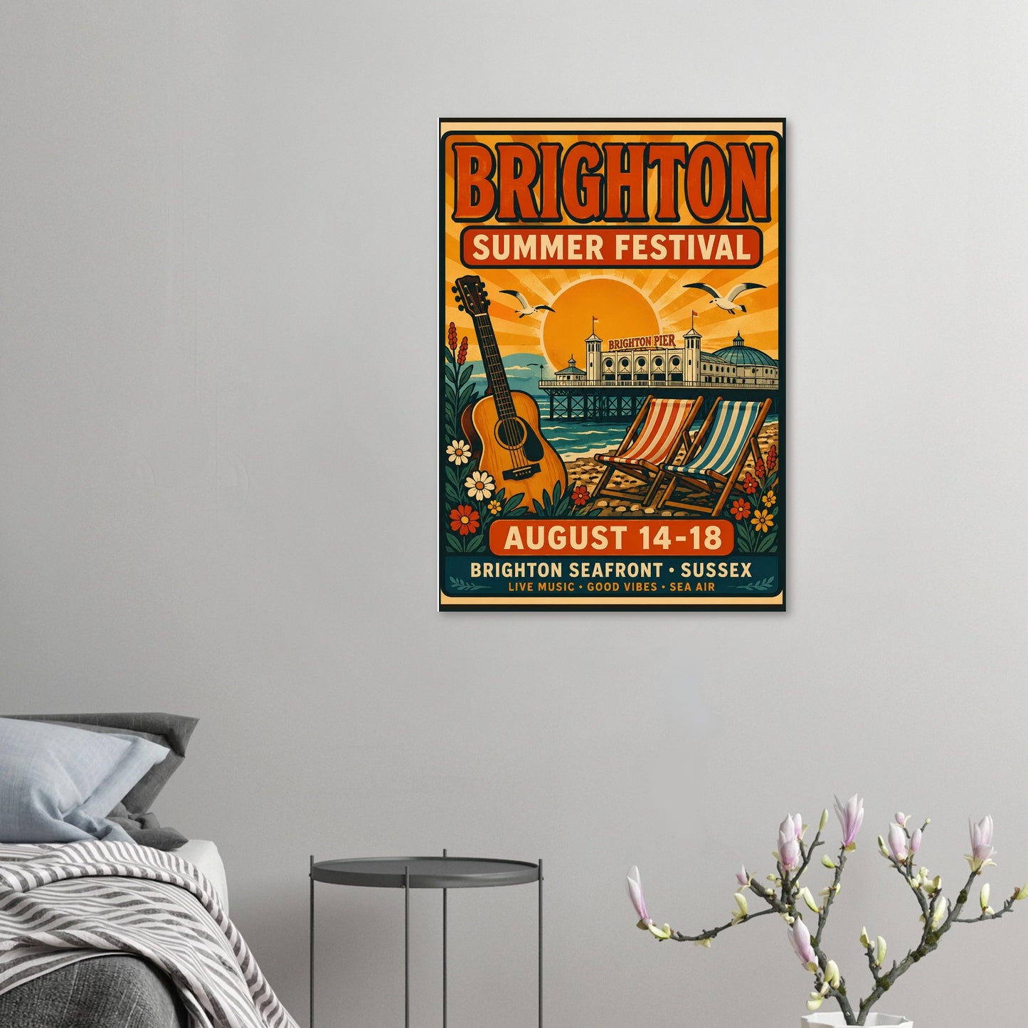 Poster for Brighton Summer Festival on a gray wall above a bed.