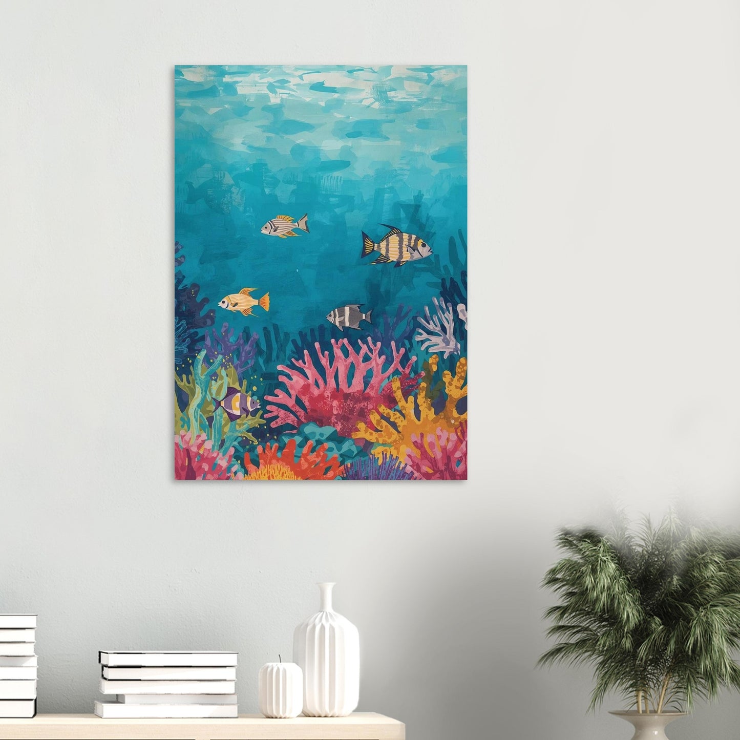 Colorful underwater scene painting with fish and coral on a wall above a shelf.