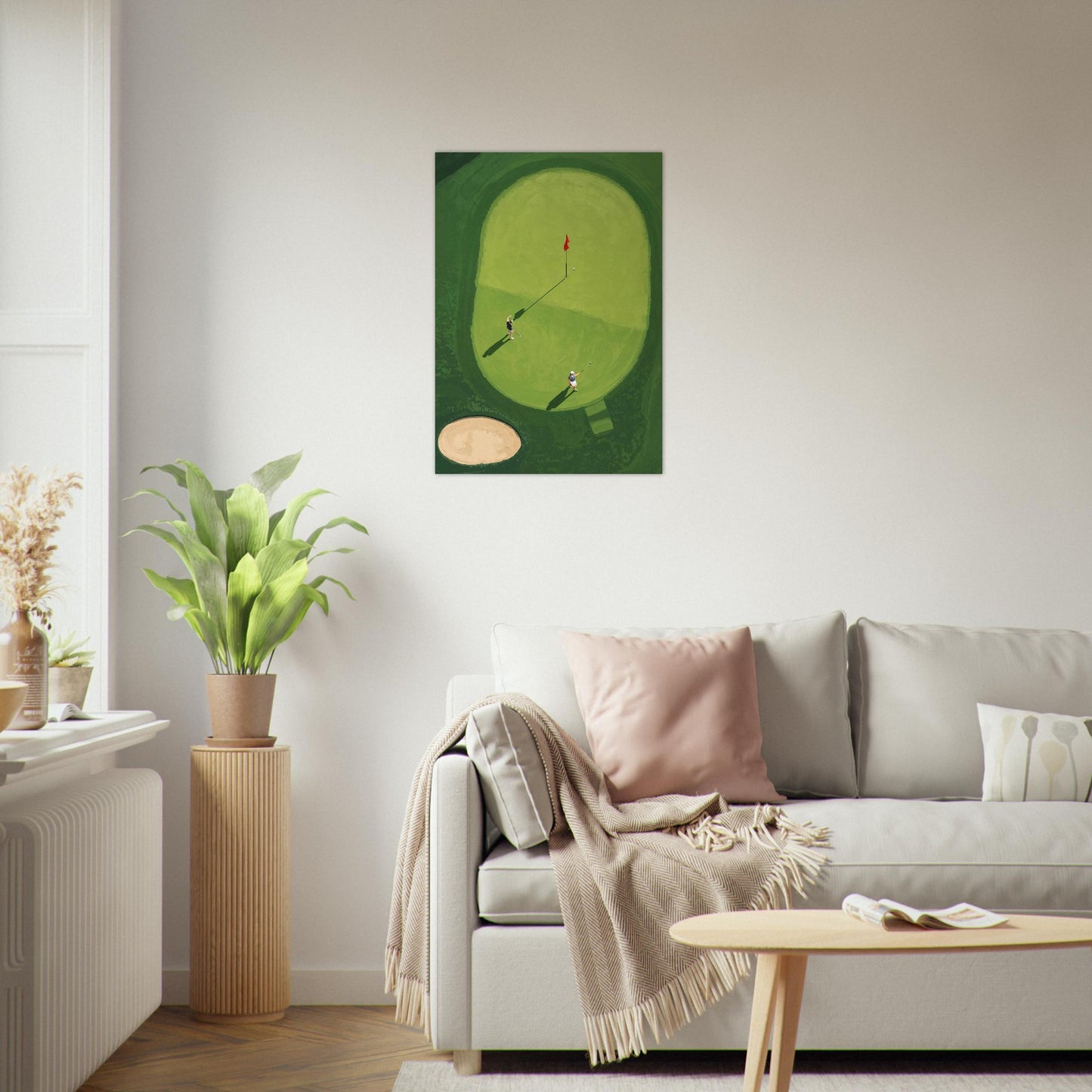 Living room with a painting of a golf course on the wall above a sofa.