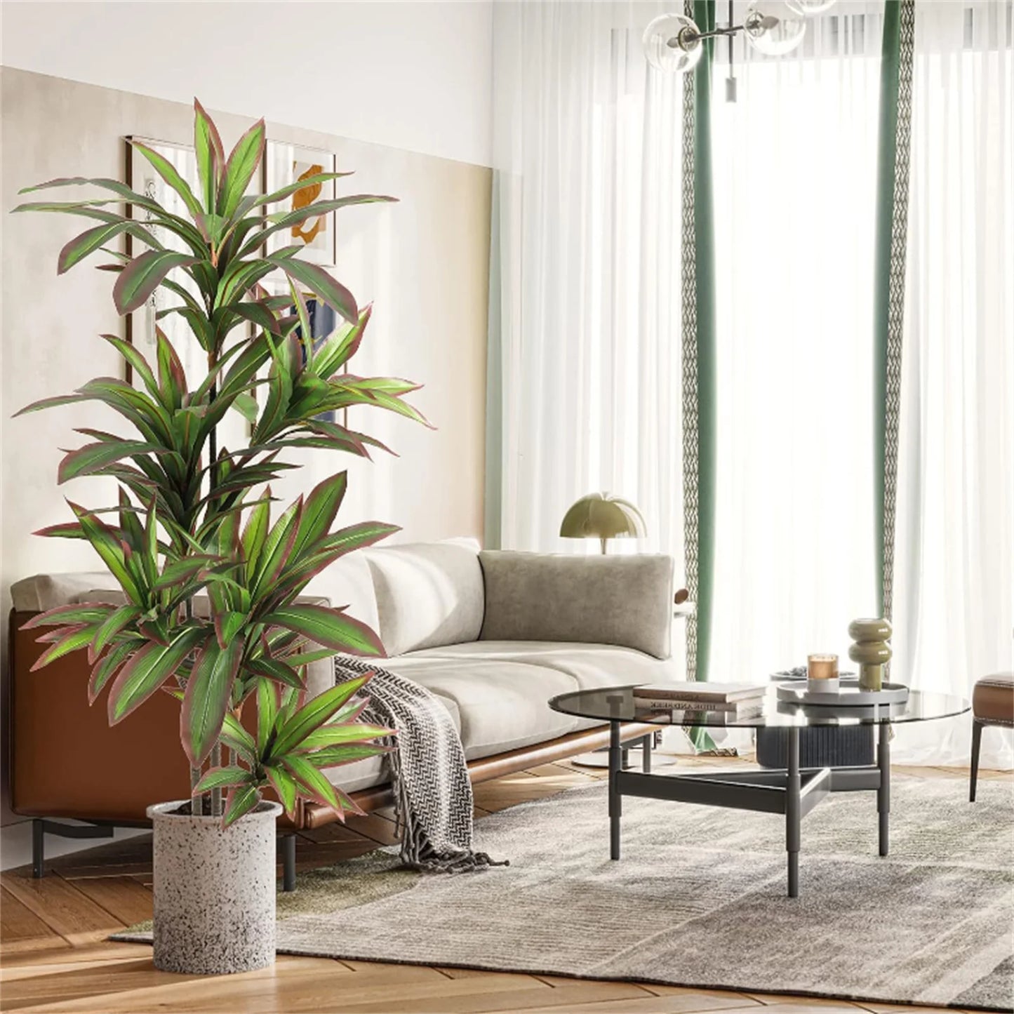 Living room with a large potted artifical plant, sofa, and coffee table.
