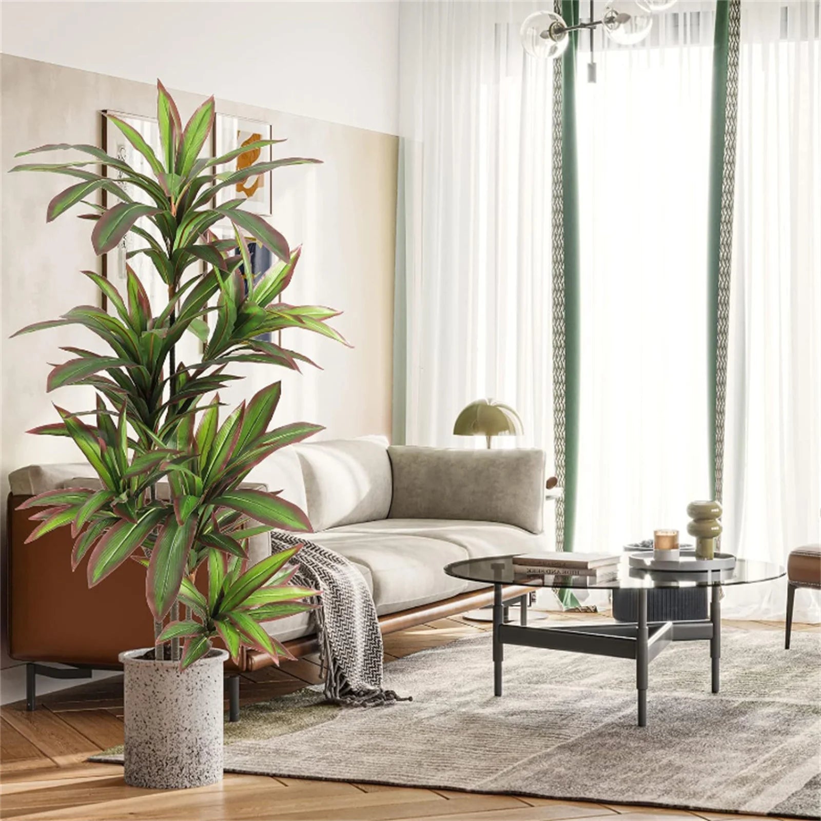 Living room with a large potted artifical plant, sofa, and coffee table.