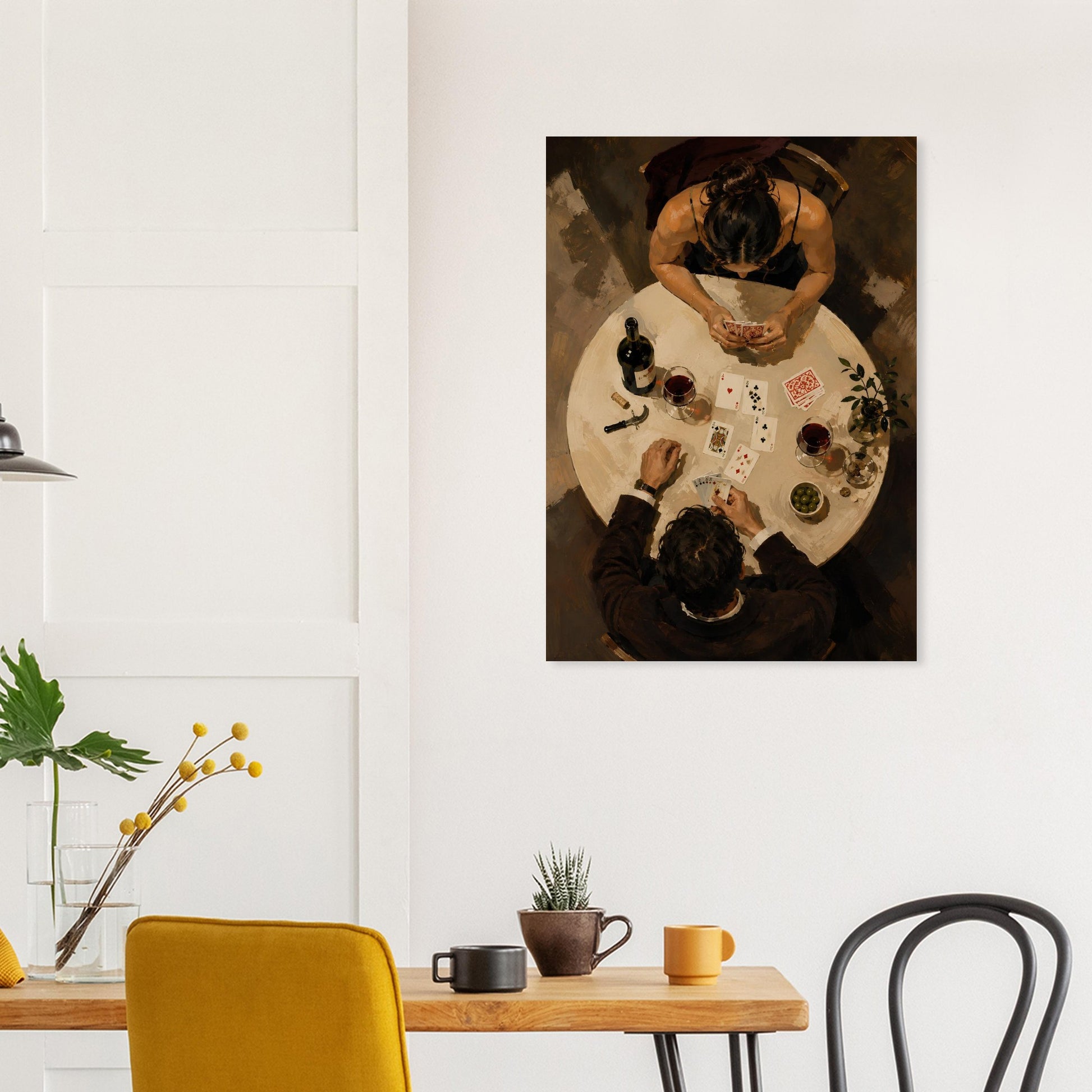 After Dinner wine and card game art print styled above a dining table with yellow accent chairs