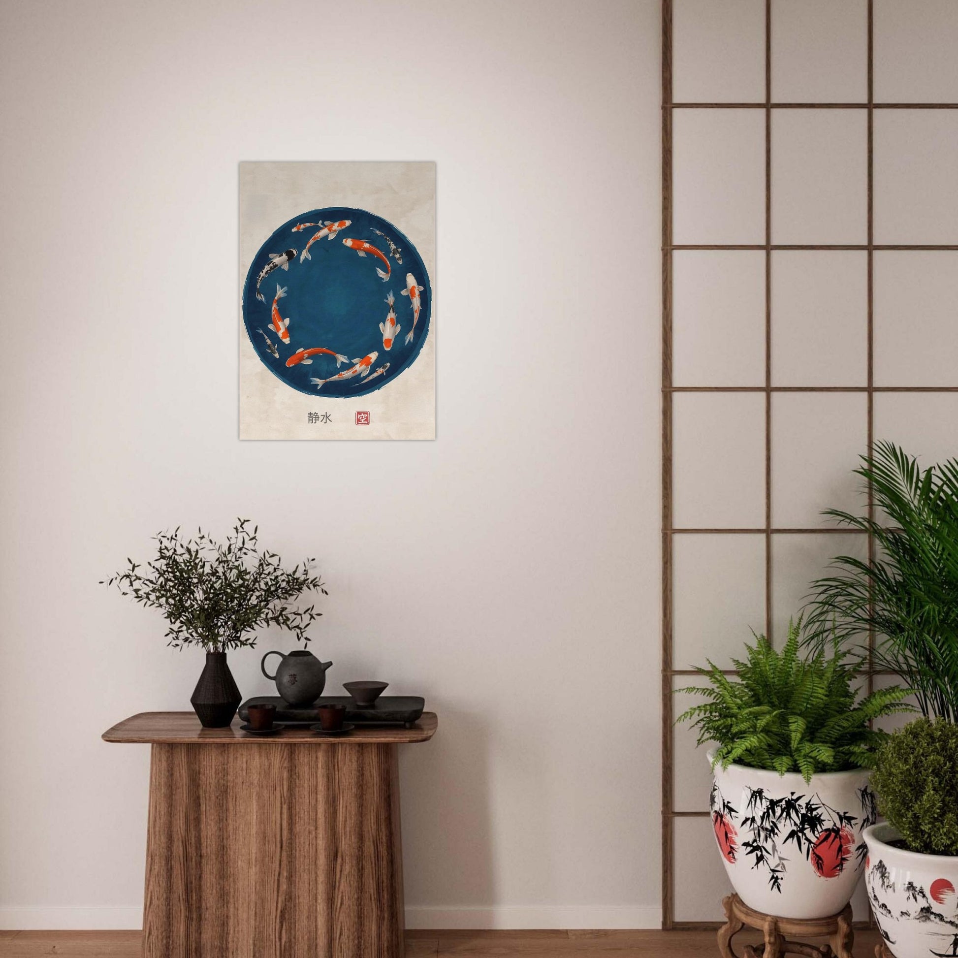 Decorative wall art with koi fish design on a white wall above a wooden table with plants and tea set.