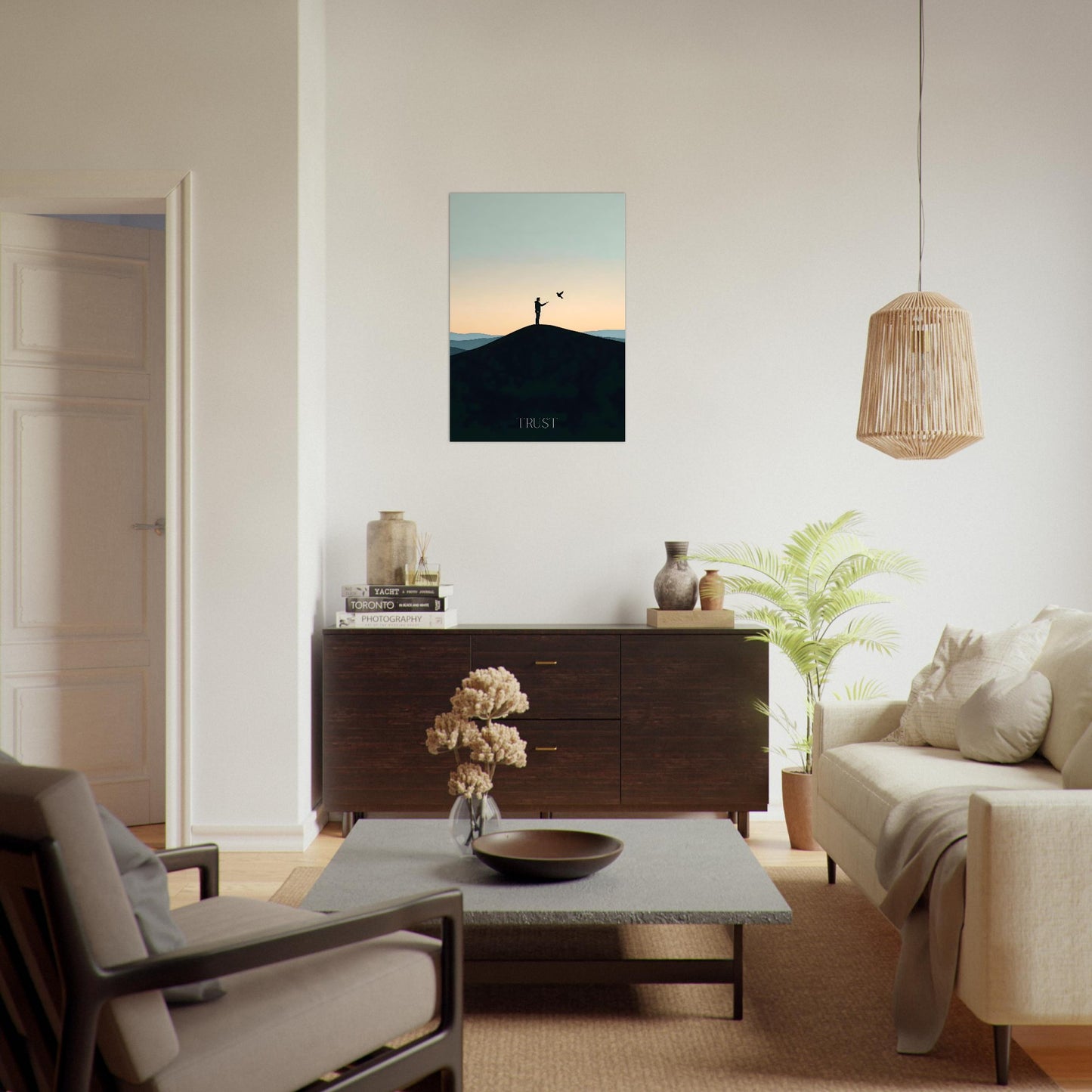 Framed trust sunset poster leaning against a wall in a bright Scandinavian living room