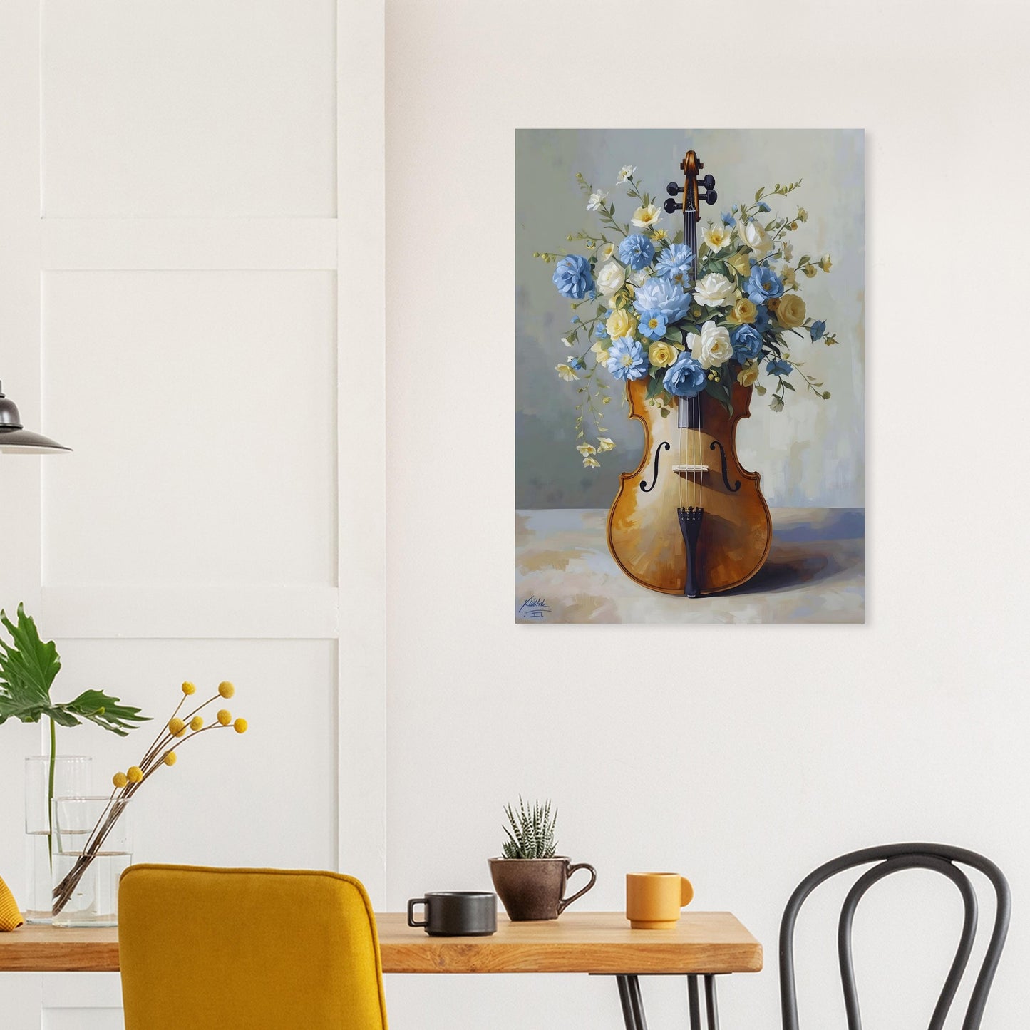 Painting of a violin-shaped vase with flowers on a wall above a table with chairs.