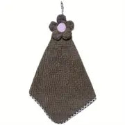 Brown textured towel with a pink flower on a white background