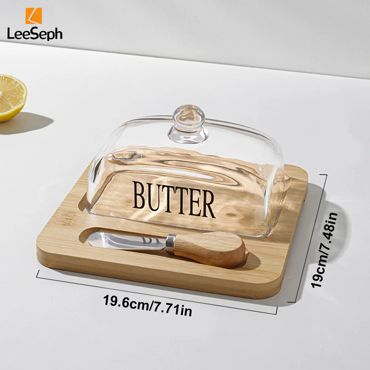 Butter dish with wooden base and glass cover, featuring the brand 'LeeSeph'.