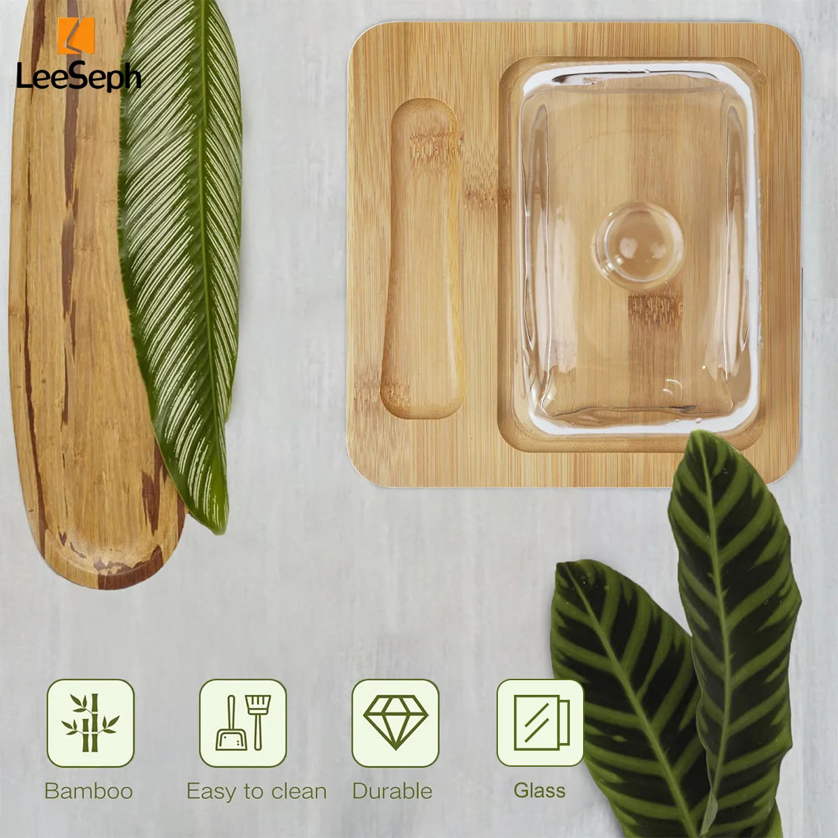 Bamboo and glass container with leaves on a light background, featuring LeeSeph branding.