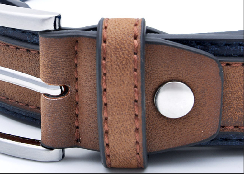 Close-up of a brown leather belt with metal buckle on a white background