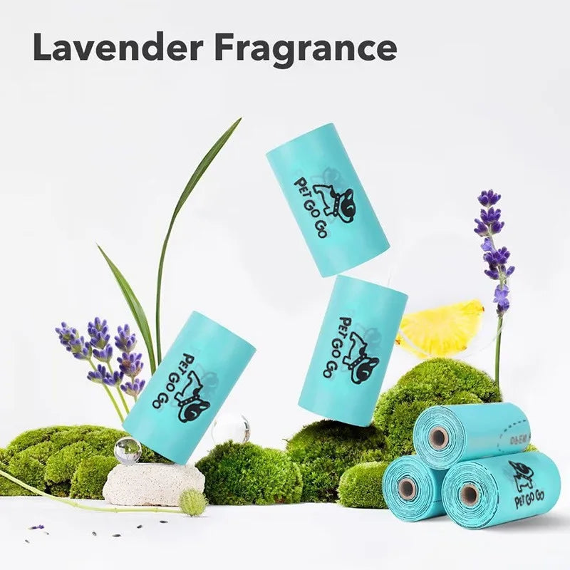 Rolls of pet waste bags with lavender fragrance on a natural background