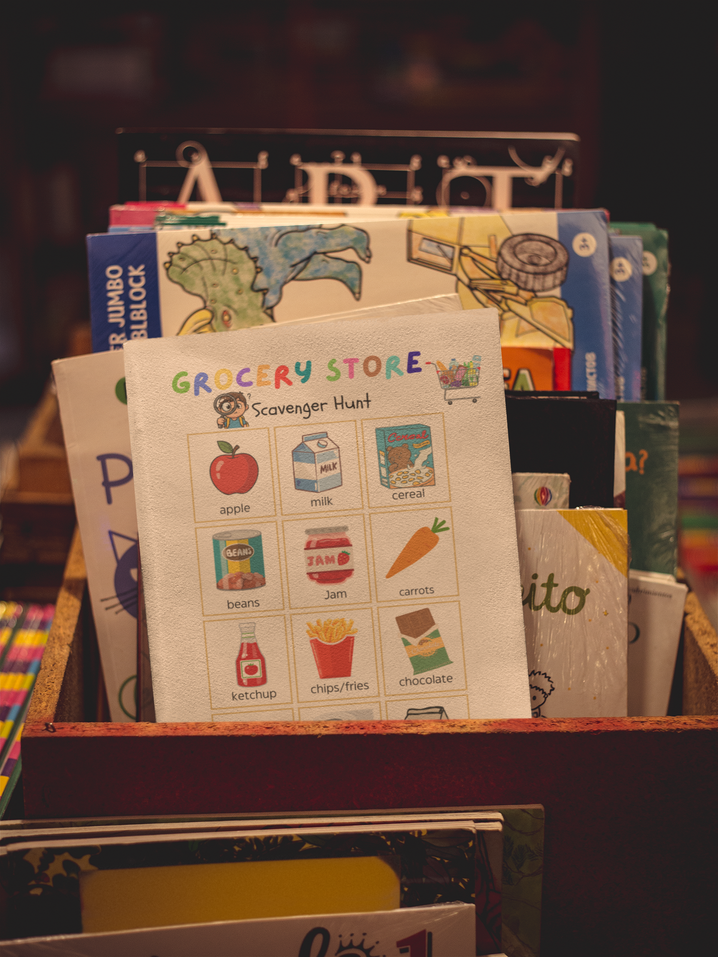 Children's educational materials including books and a 'Grocery Store Scavenger Hunt' sheet.