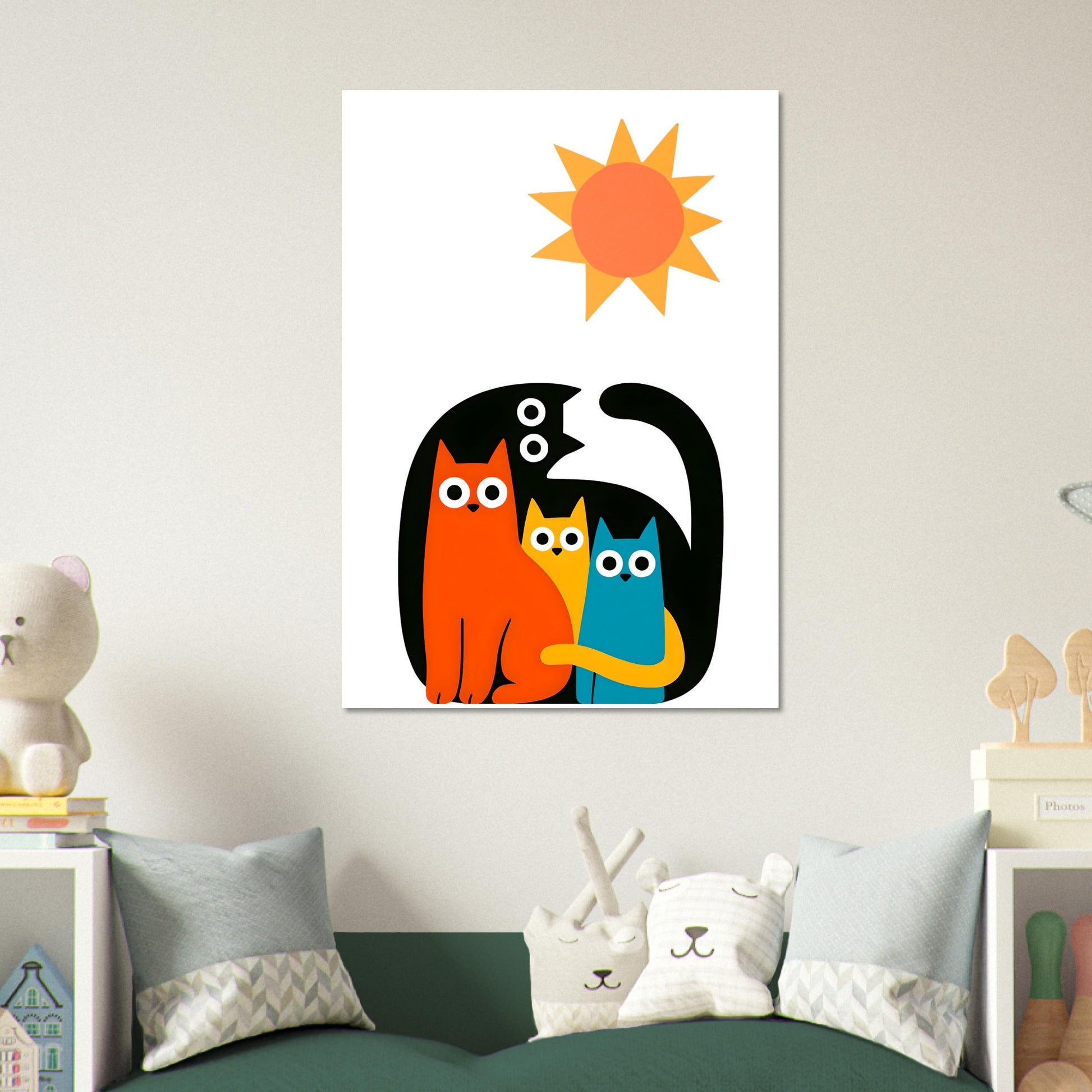 Colorful illustration of three cats and a sun on a wall above a bed with decorative pillows.