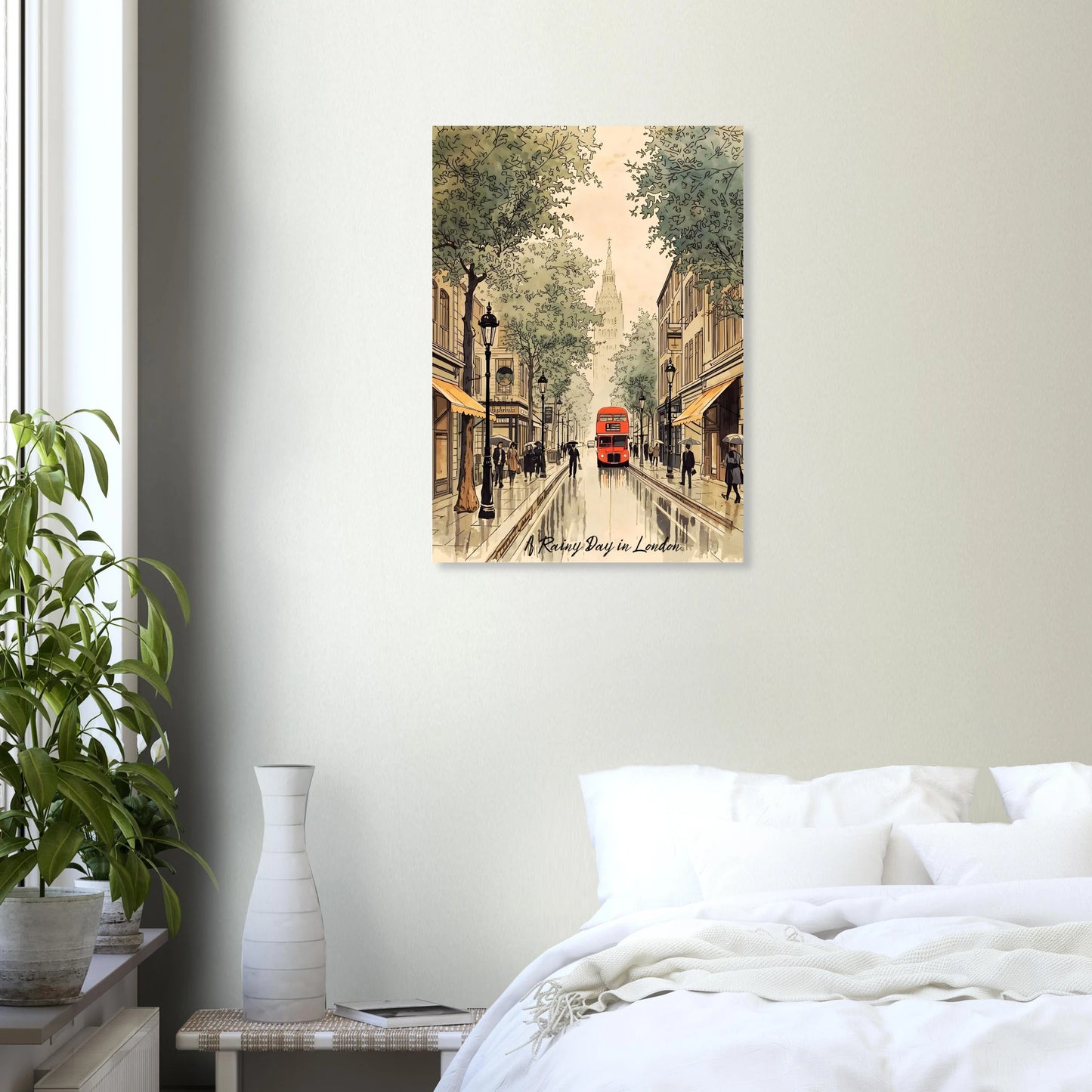 Framed artwork of a city street scene with a red bus on a wall above a bed.