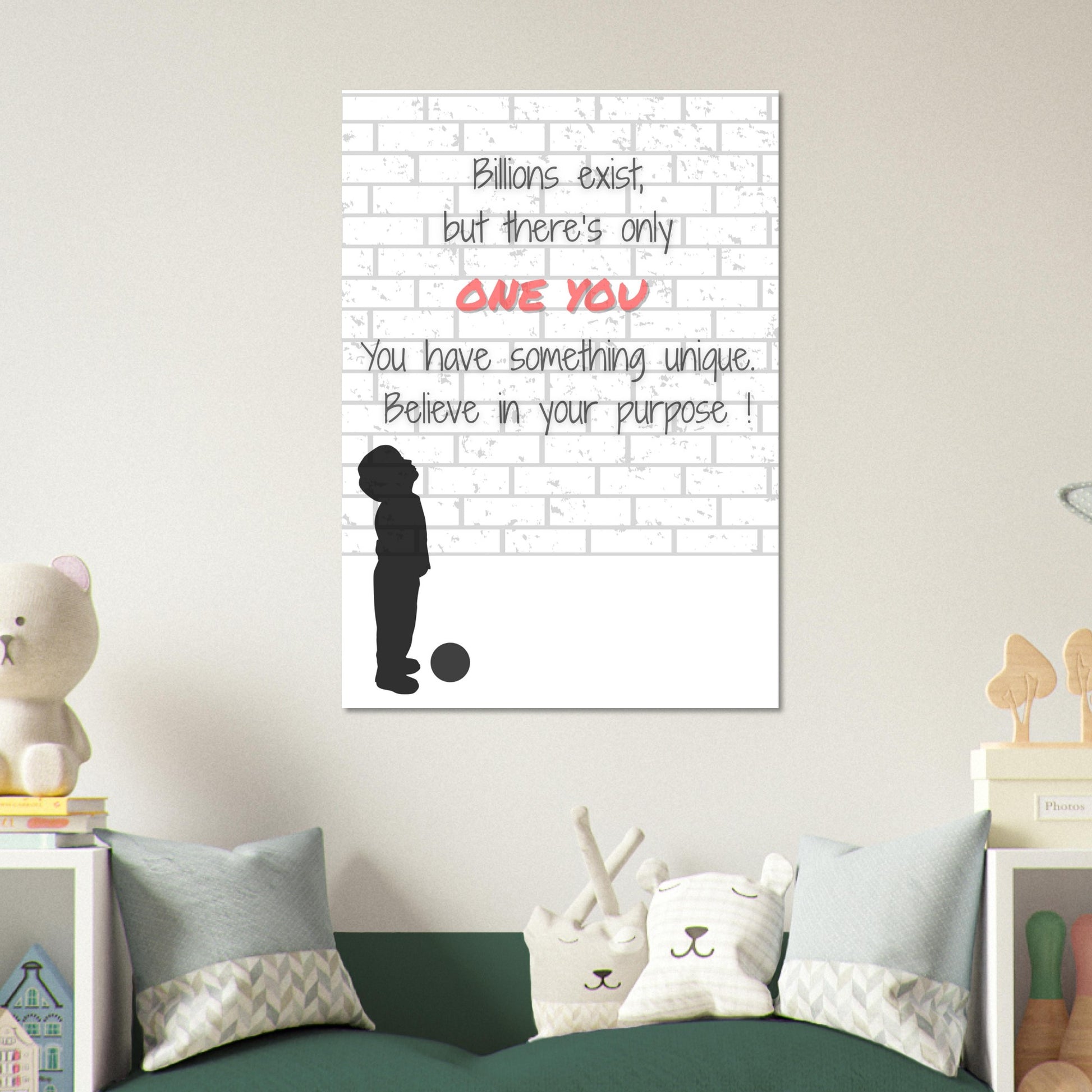 Motivational poster with text and silhouette of a child on a wall in a room with toys and pillows.