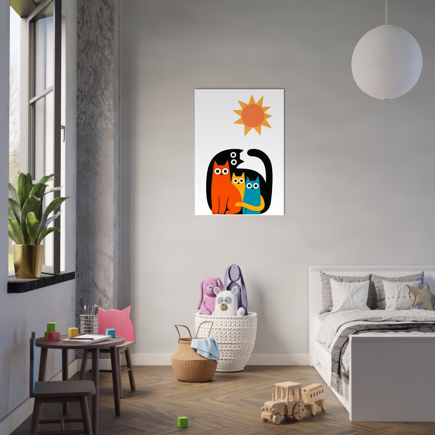 Poster with three cats and a sun on a white background on a grey wall in a childrens bedroom