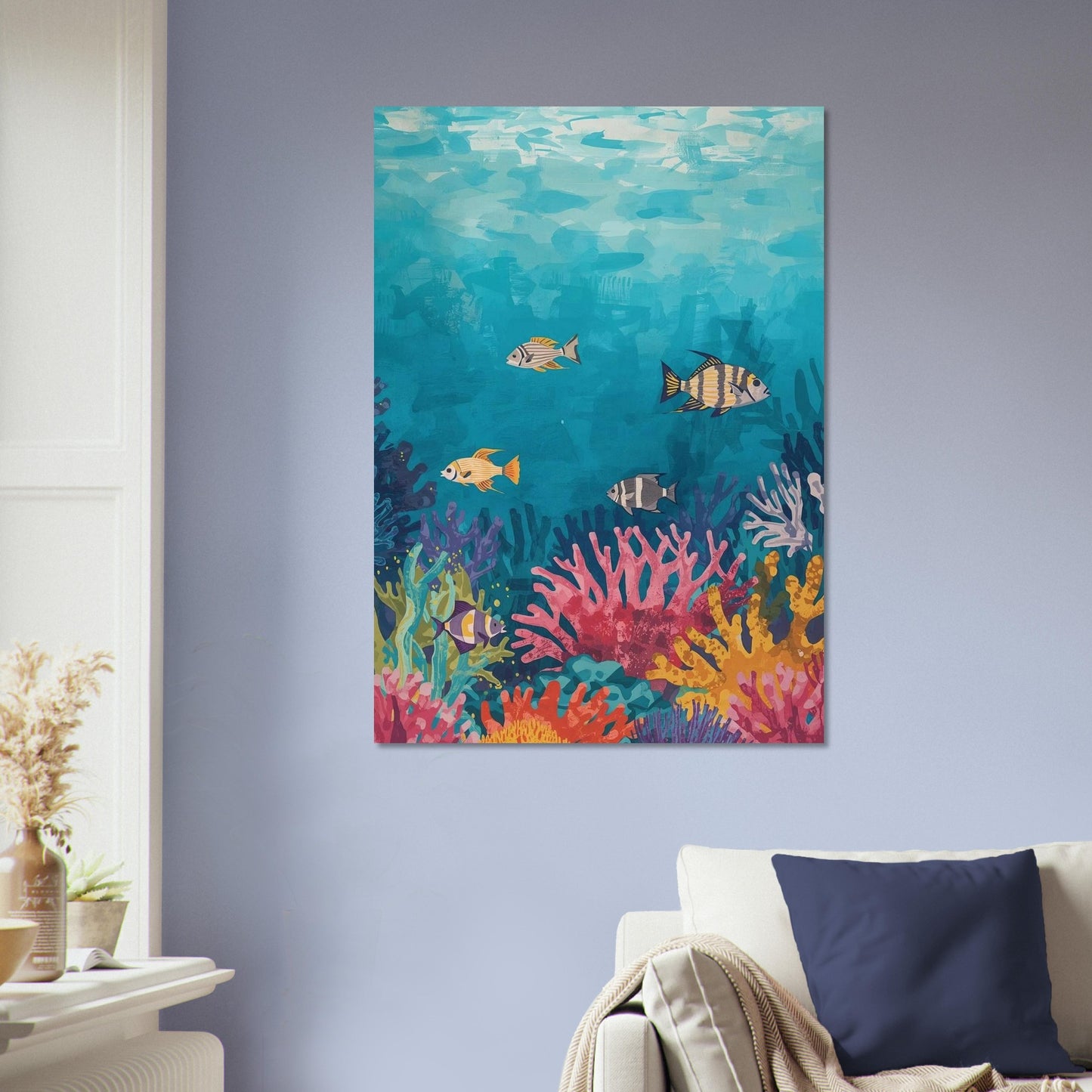 Colorful underwater scene painting on a wall above a sofa.