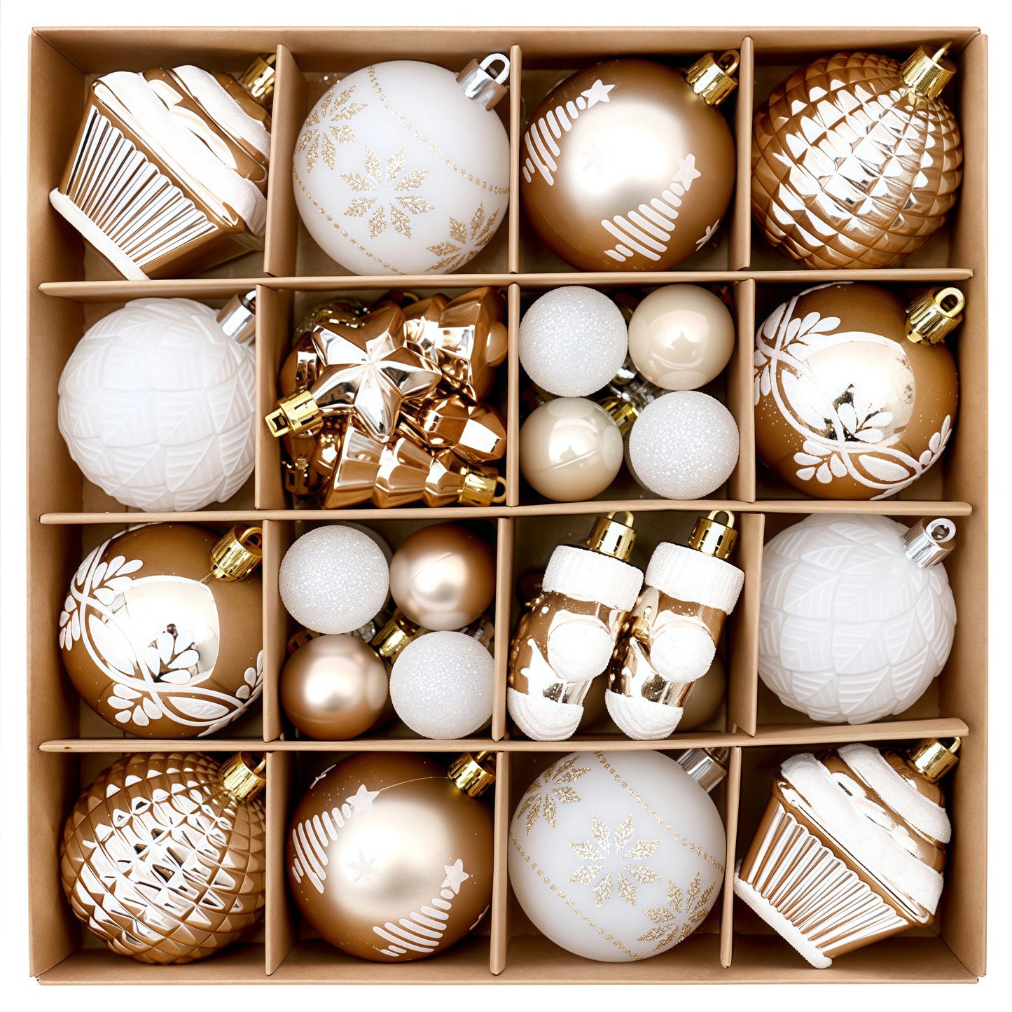 Assorted Christmas ornaments in a box, including gold, white, and decorative shapes.
