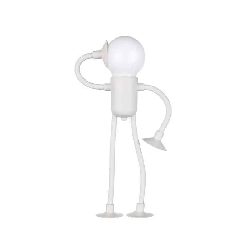 White lamp shaped like a stick figure on a white background