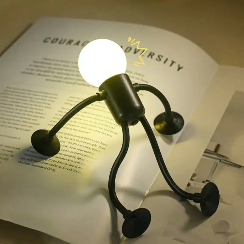 Changeable Shape Sportsman Night Light – battery-powered mini light with adjustable figure design.