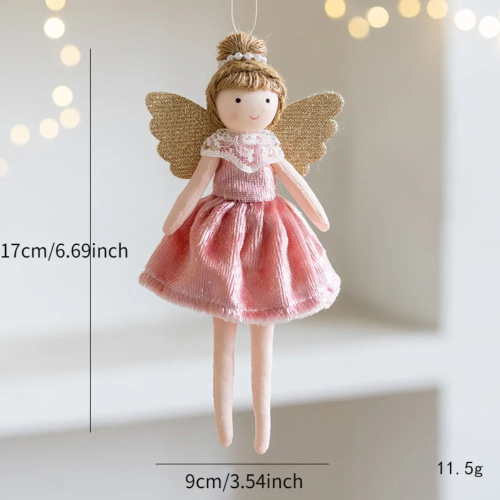 Small angel doll with wings, pink dress, and measurement details on a neutral background.