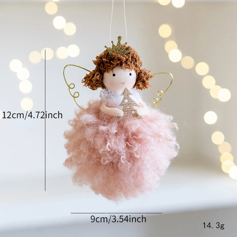 Small angel figurine with measurements on a light background