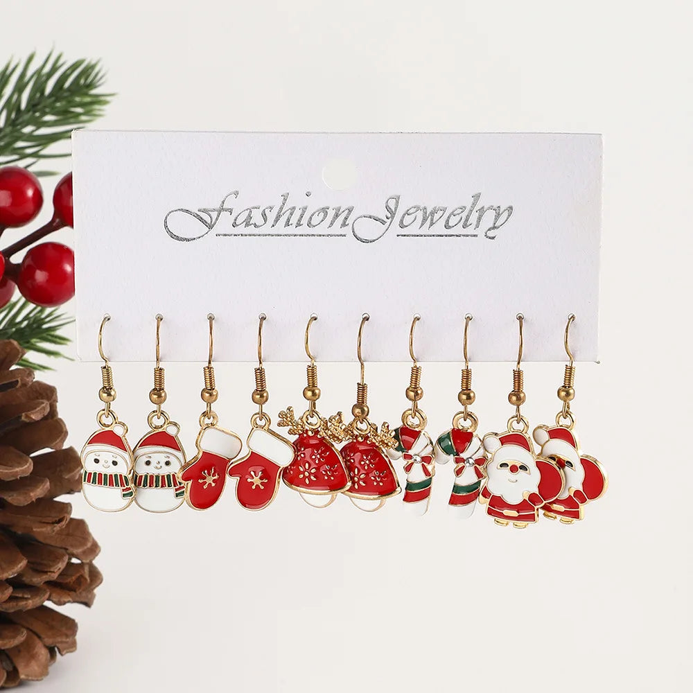 Set of Christmas-themed earrings on a 'Fashion Jewelry' card with decorative elements.