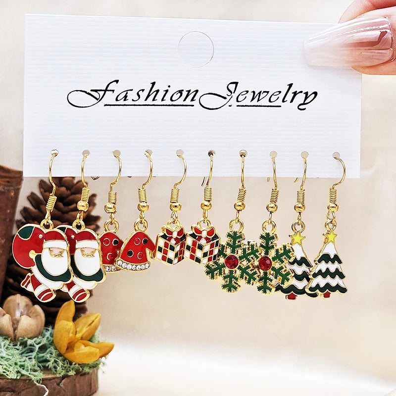Set of Christmas-themed earrings on a 'Fashion Jewelry' card with decorative background.