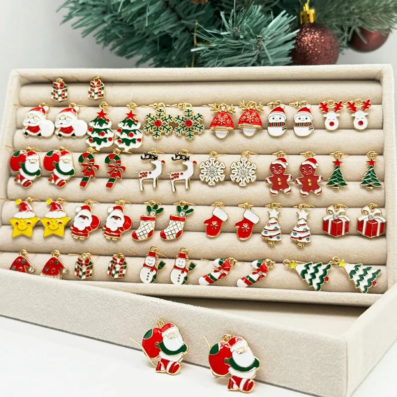 Christmas earring set with Santa, snowflake, and gingerbread designs on display cards
