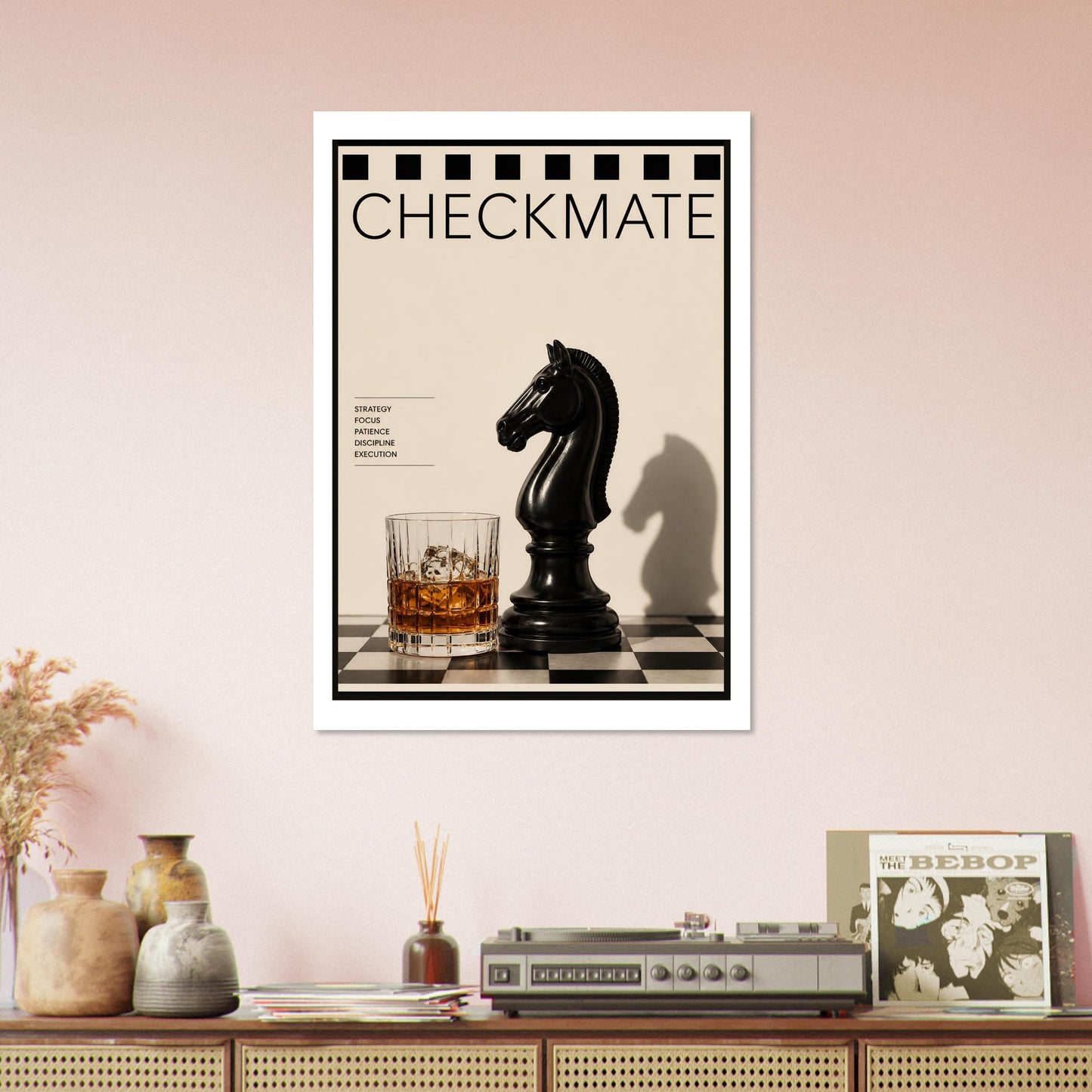 Framed poster of a chess piece and glass on a checkered surface, above a wooden shelf with decorative items.