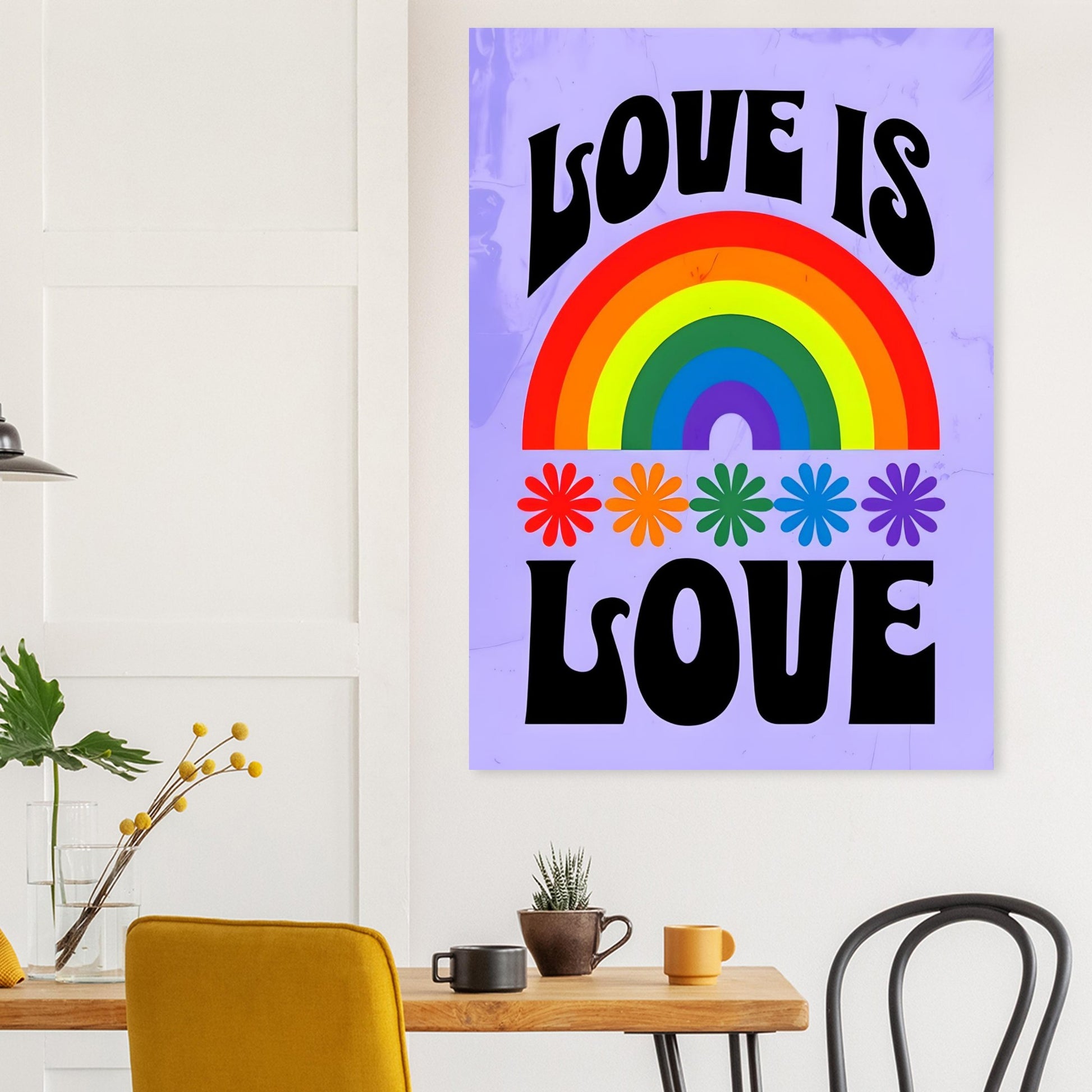 Poster with rainbow and flowers design on a wall above a table with decor items.