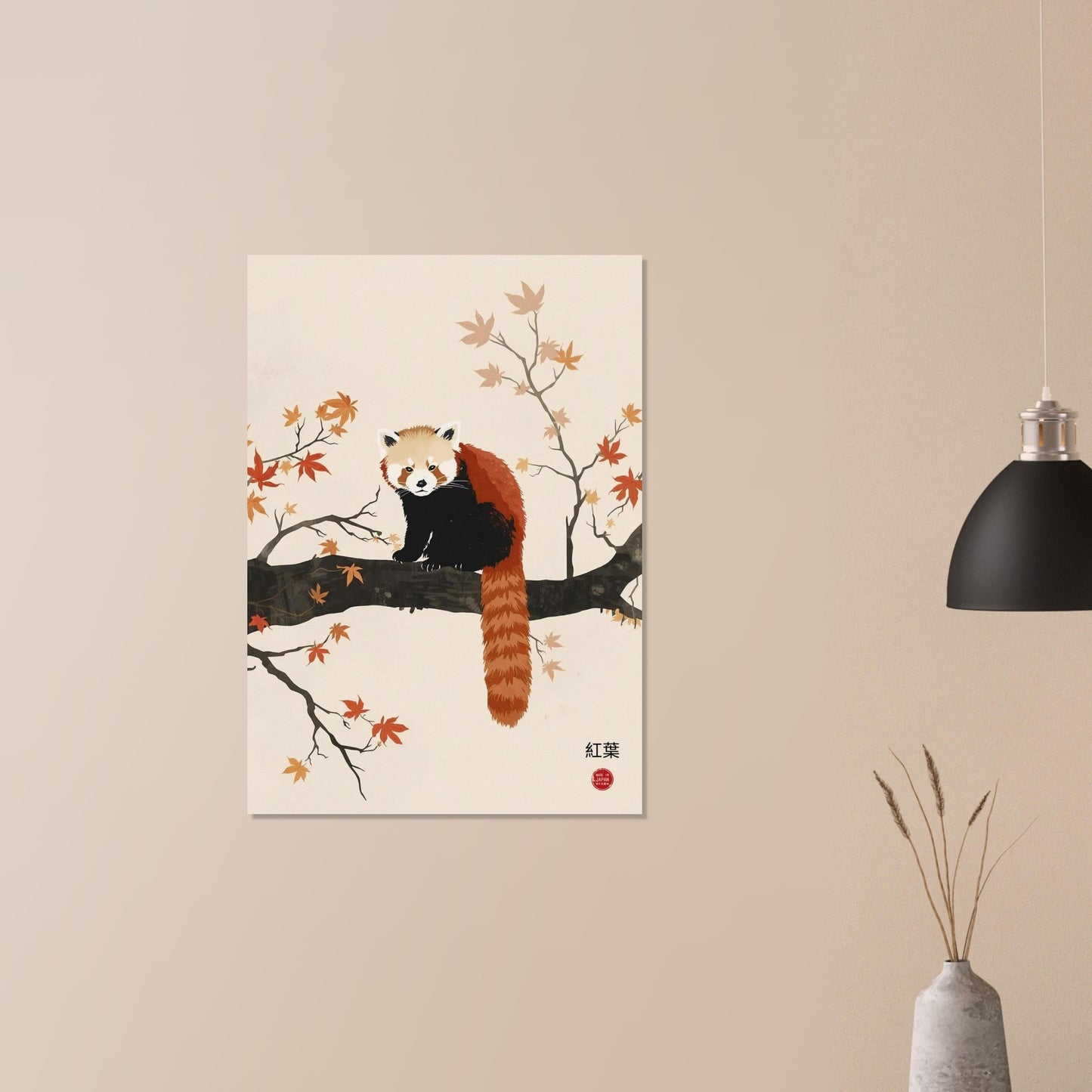 Framed artwork of a red panda on a branch with autumn leaves on a beige wall.