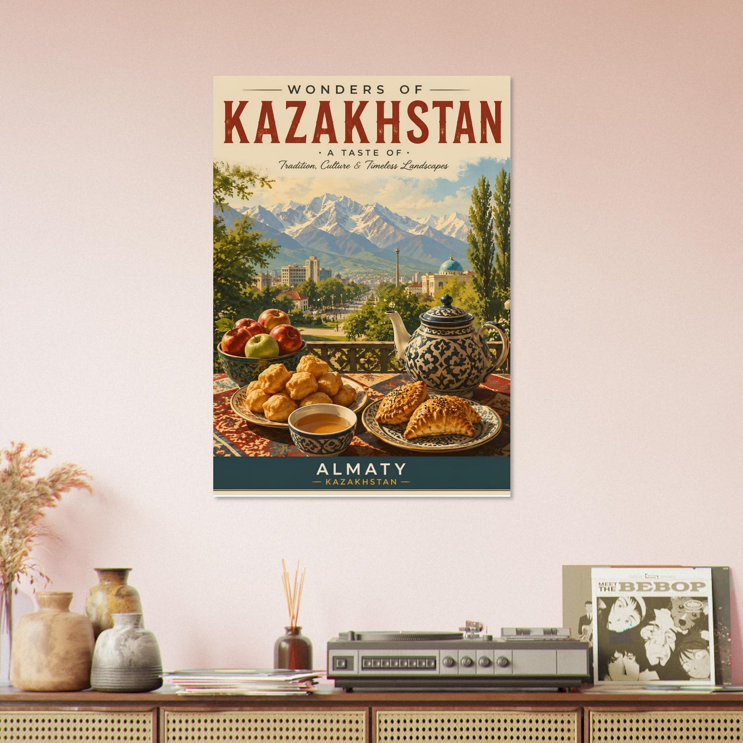 Kazakhstan travel poster displayed above a decorative shelf with ceramic accessories in a warm, modern living space.