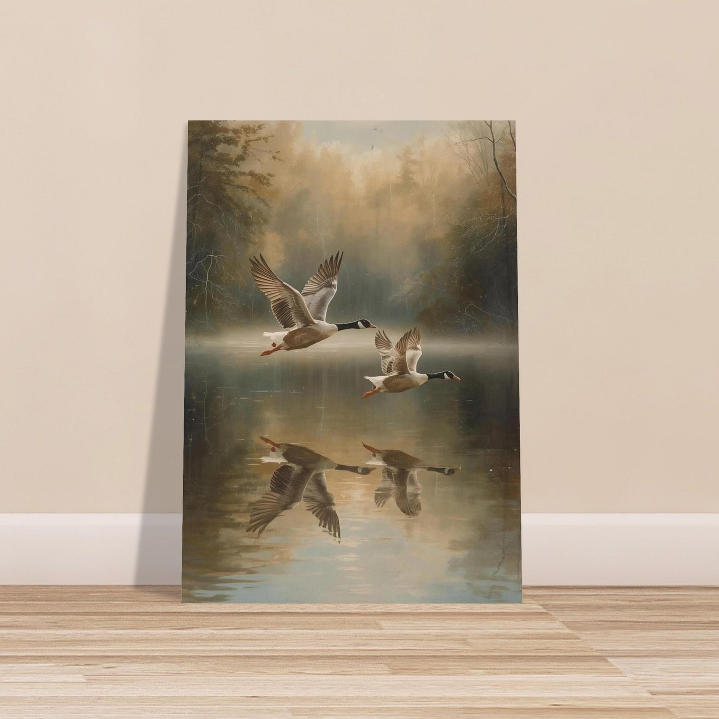 Framed artwork of geese flying over water on a wall.
