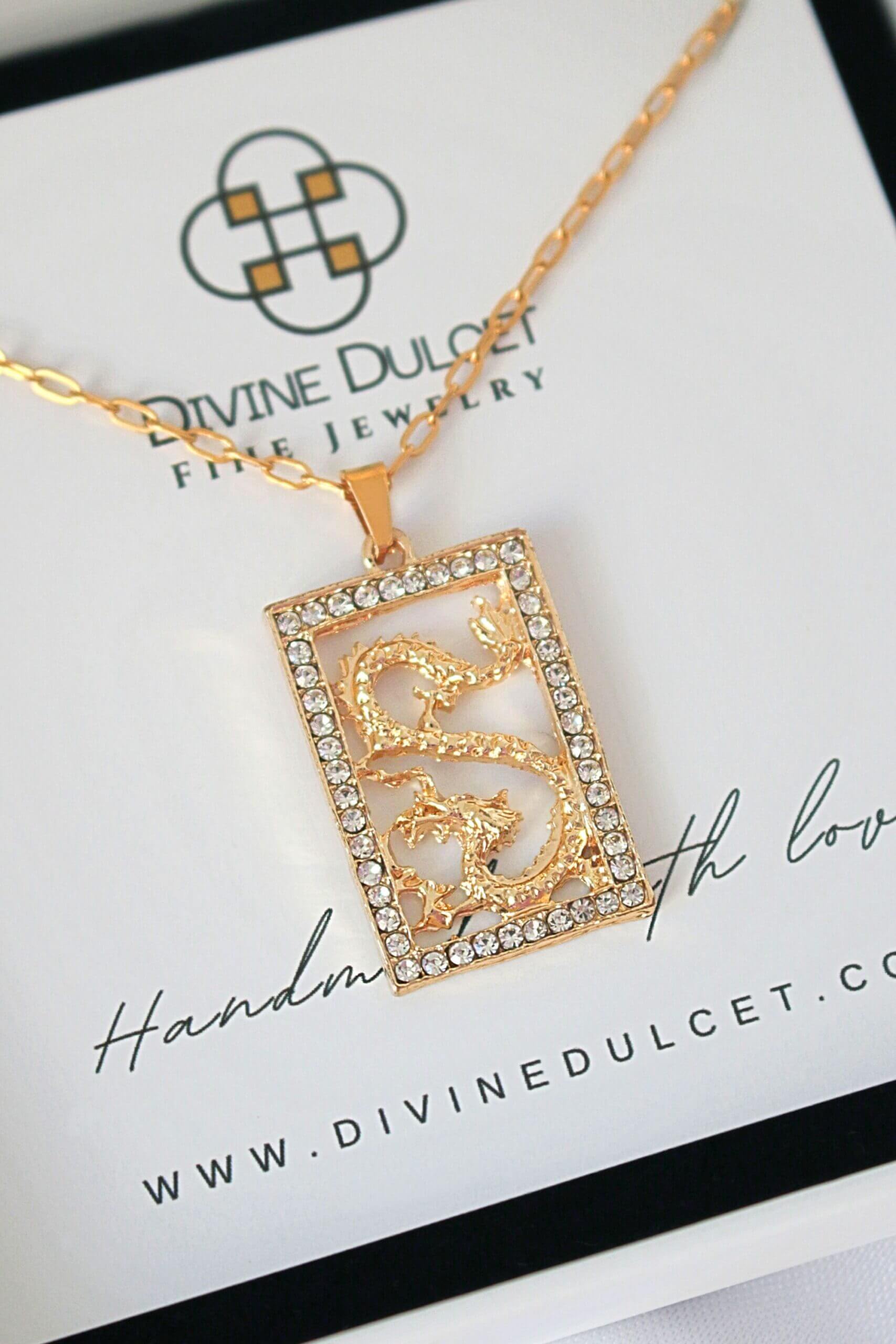 Gold necklace with a star design on a Divine Dulcet card