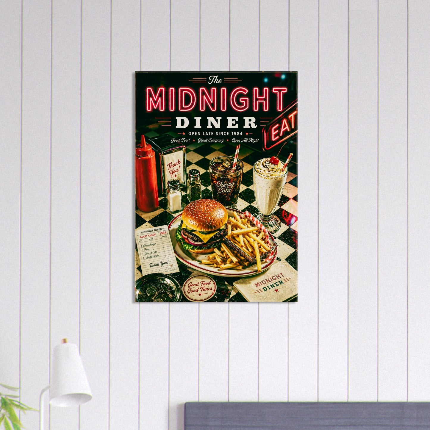 Poster of a diner scene with a burger and fries on a white wall.
