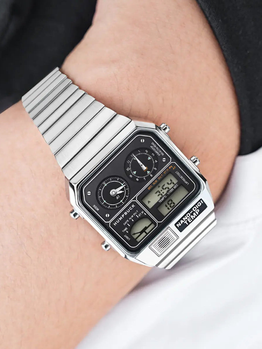 Silver digital watch on a wrist with a white background