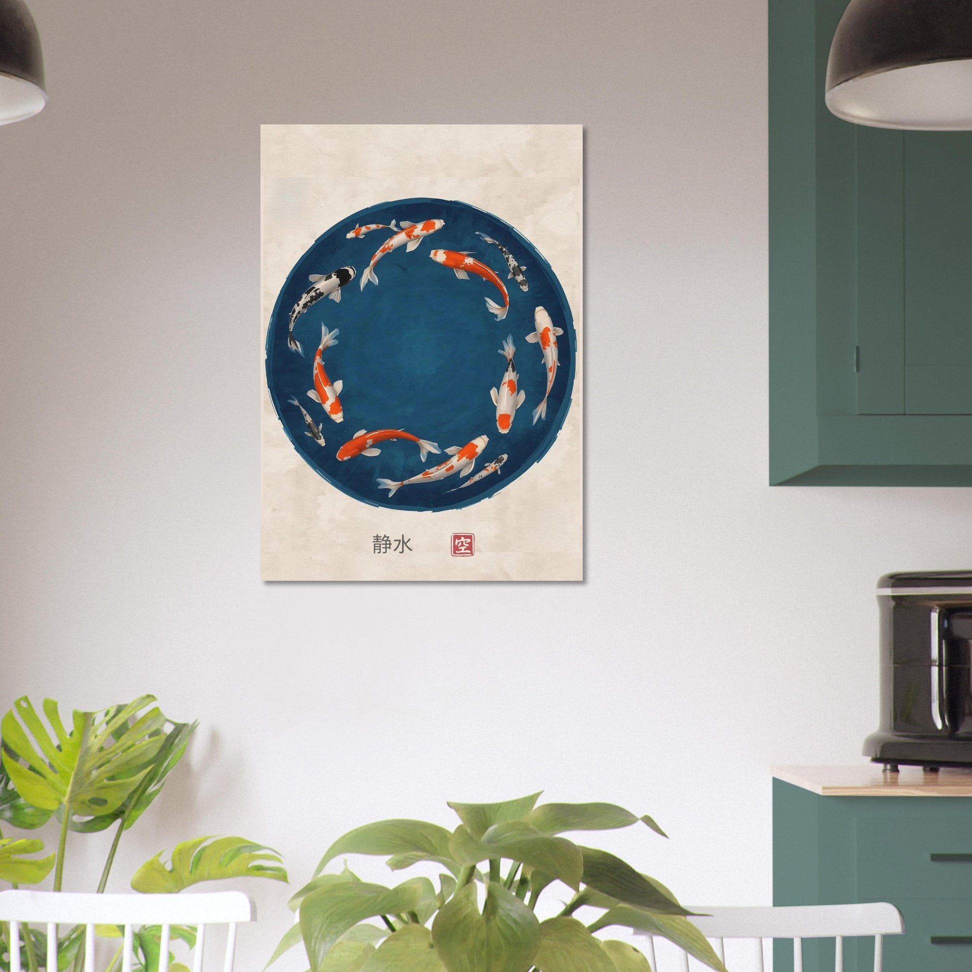 Framed artwork of koi fish in a circle on a wall above a dining table with plants.