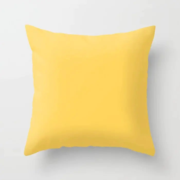 Yellow pillow on a light gray background