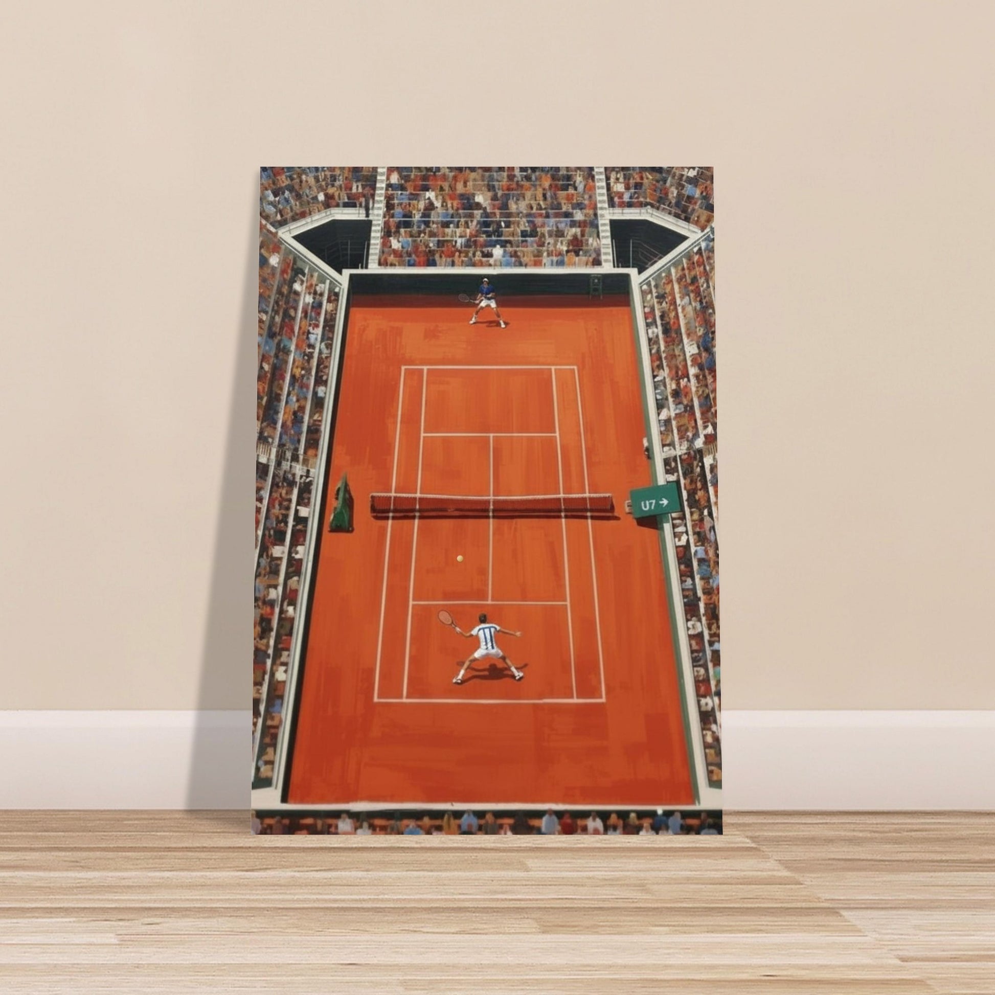 Framed artwork of a tennis court with spectators on a beige wall.