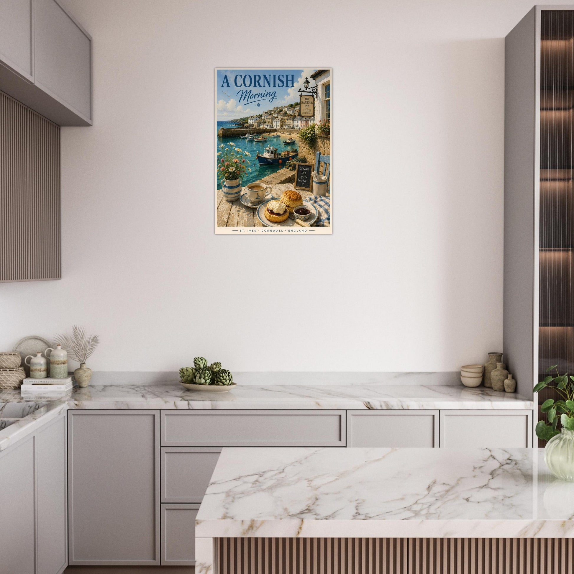 Kitchen with a framed picture of a Cornish seaside scene on the wall.