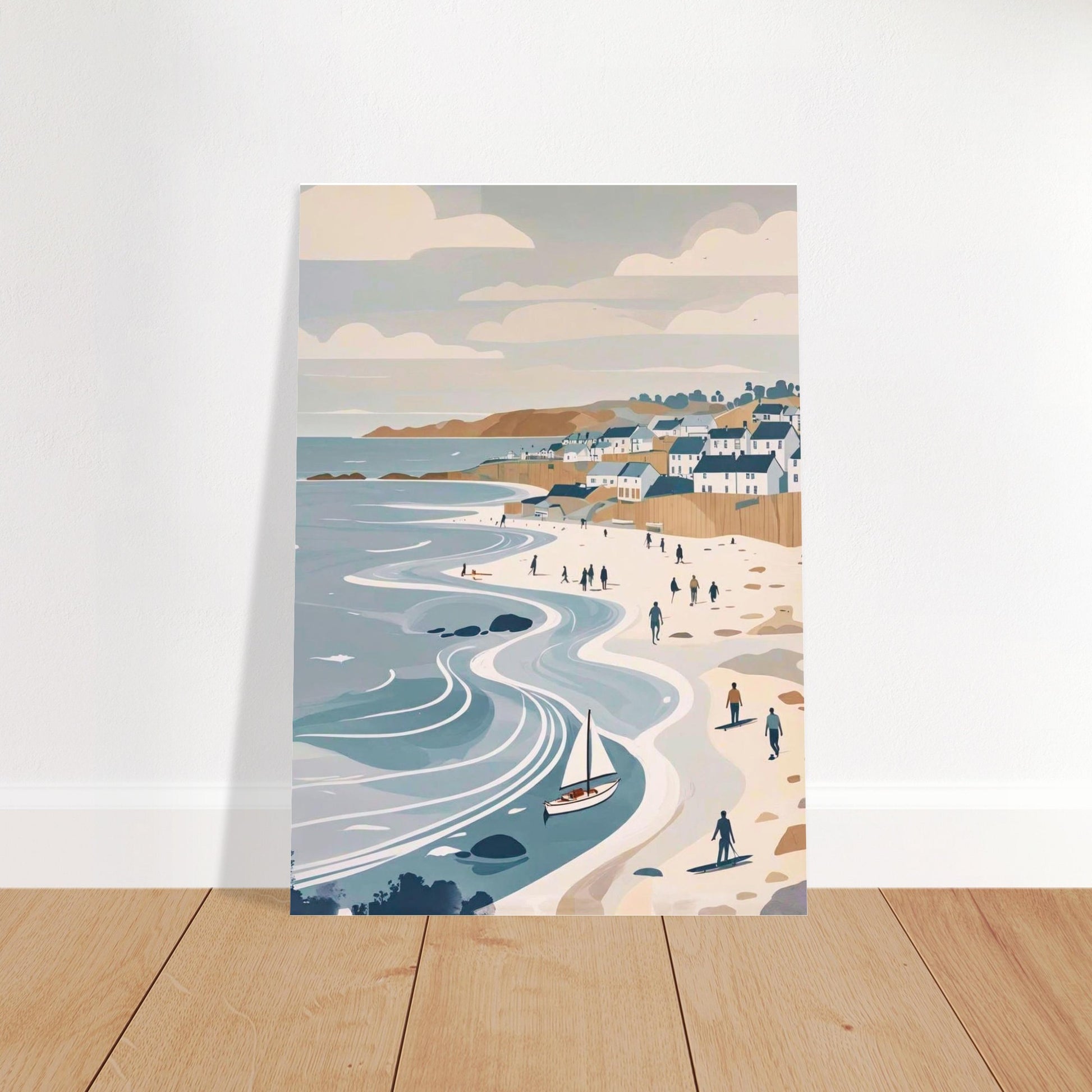 Unframed coastal village and flowing waves art print leaning against a wall and on wooden flooring
