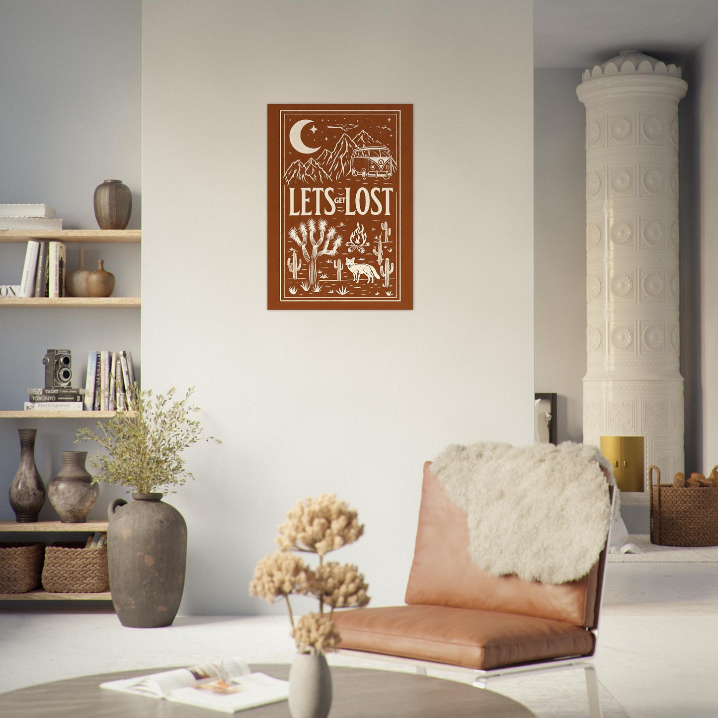 Decorative poster titled 'Let's Get Go Lost' in a living room setting with a brown leather chair and bookshelf.