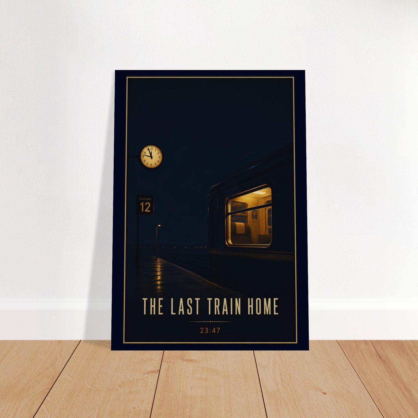 Framed poster of a train at night with 'The Last Train Home' text on a white wall.